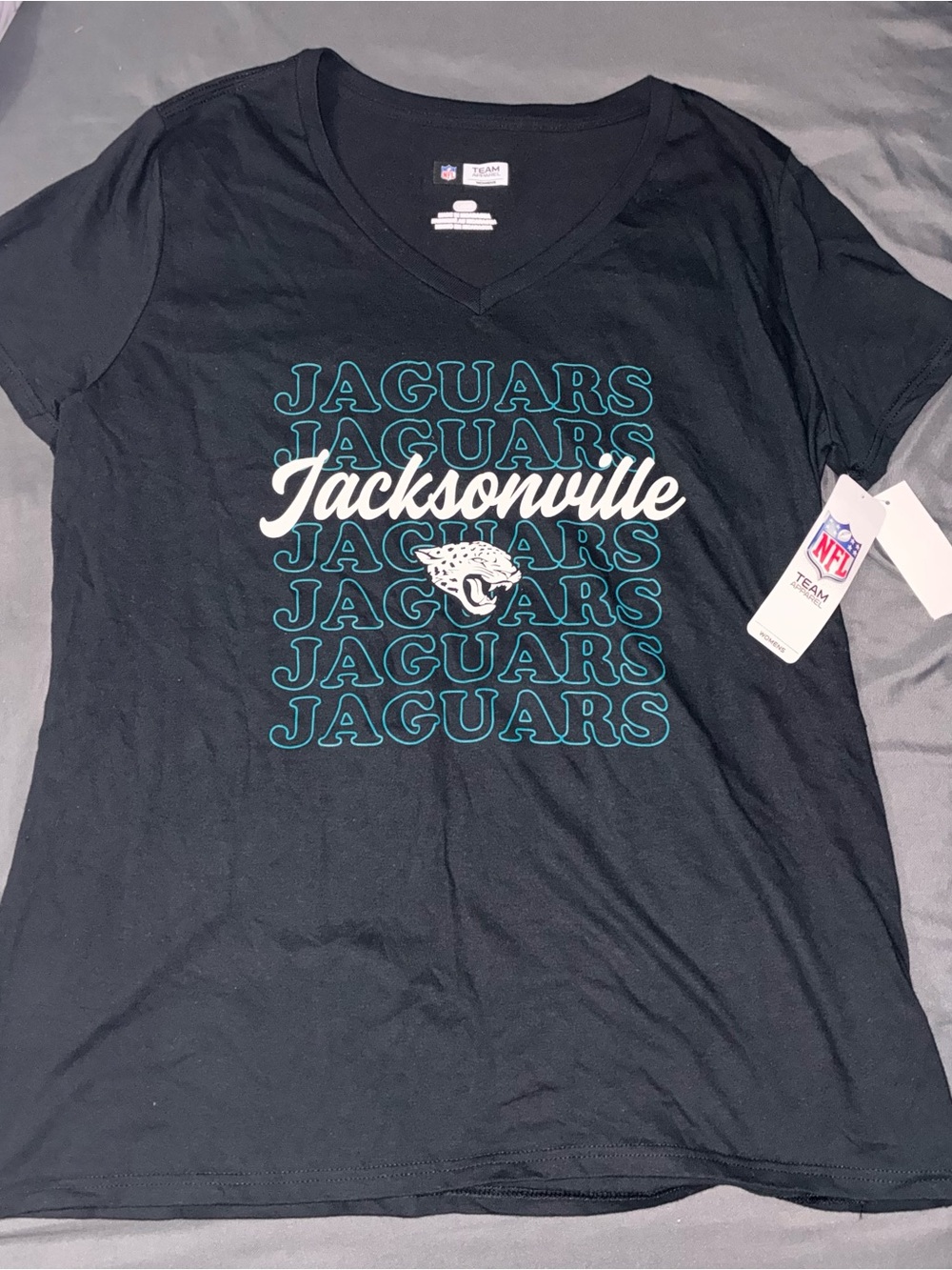 Team Apparel Jacksonville Jaguars Black V-Neck Tee with Teal and White Graphics